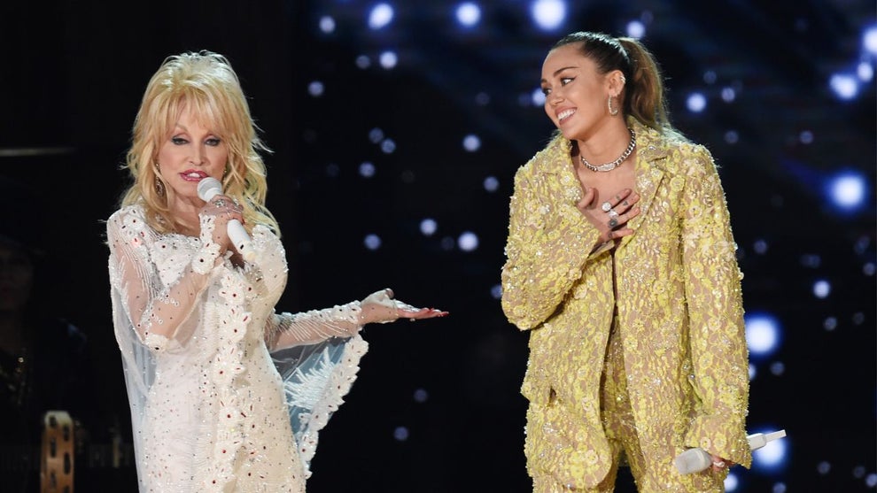 Dolly Parton (L) and Miley Cyrus perform onstage during the 61st Annual GRAMMY Awards at Staples Center on February 10, 2019 in Los Angeles, California. (Credit: Kevin Winter/Getty Images for The Recording Academy)